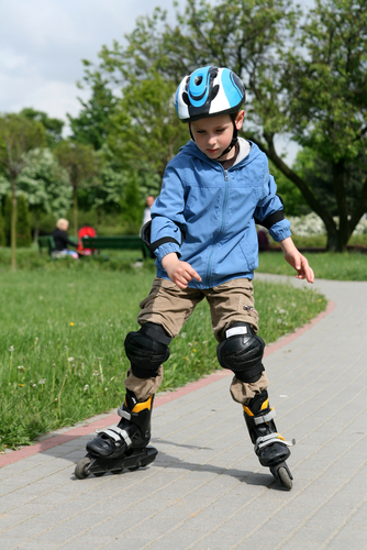 boy roller skating with shadow